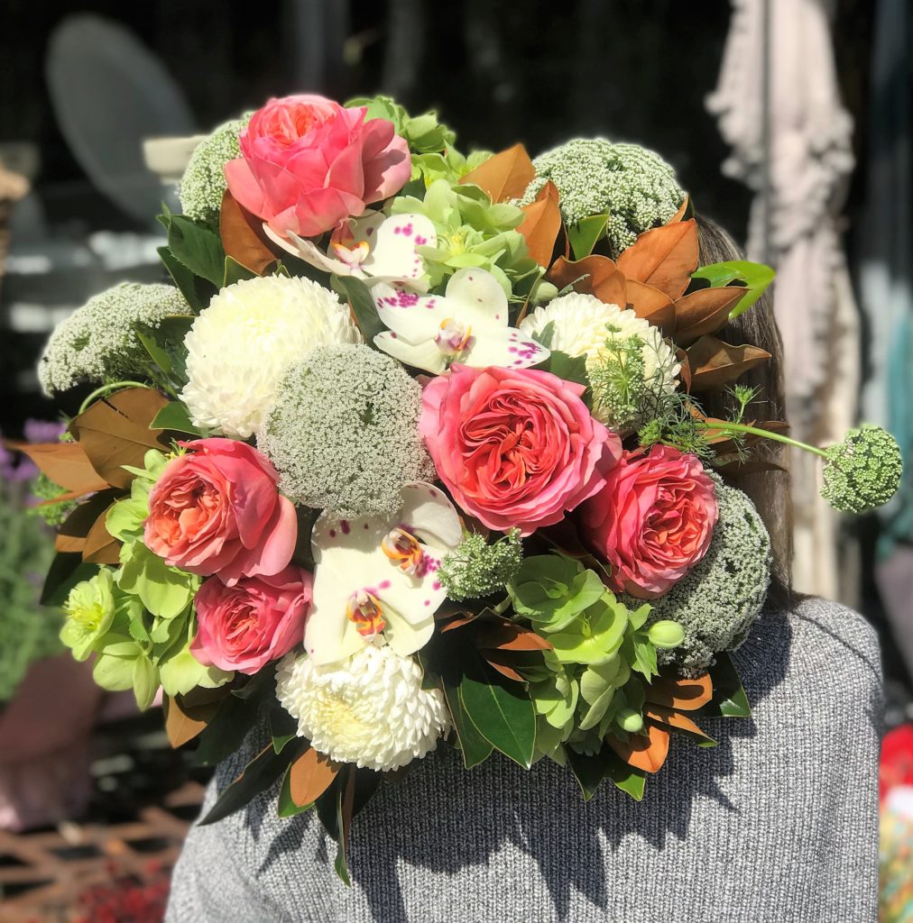 Peachy flower arrangement by Flowers by Teresa